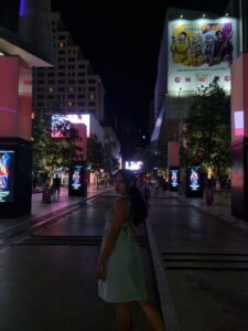 solo female traveler posing by the mall in bangkok thailand during her 1 month in Thailand Itinerary southeast asia trip