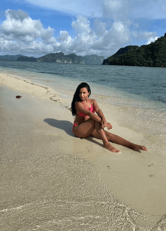 solo female traveler enjoying snake island in Palawan island, Philippines